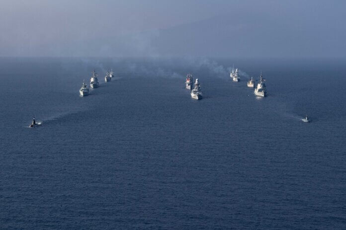 NATO ships and submarines participating in the alliance’s ‘Dynamic Manta’ anti-submarine warfare exercise sail in formation during a ‘photo exercise’ (PHOTEX). (NATO Maritime Command)