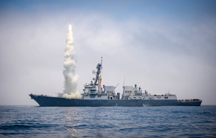 A Tomahawk missile is fired from the US Navy (USN) Arleigh Burke-class destroyer USS Dewey.