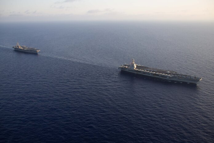 USS Gerald R Ford (right) and USS Dwight D Eisenhower (left)