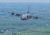 The US military focuses on Venezuela High-altitude military transport aircraft landing on runway surrounded by forest, showcasing advanced aviation technology and defense capabilities.